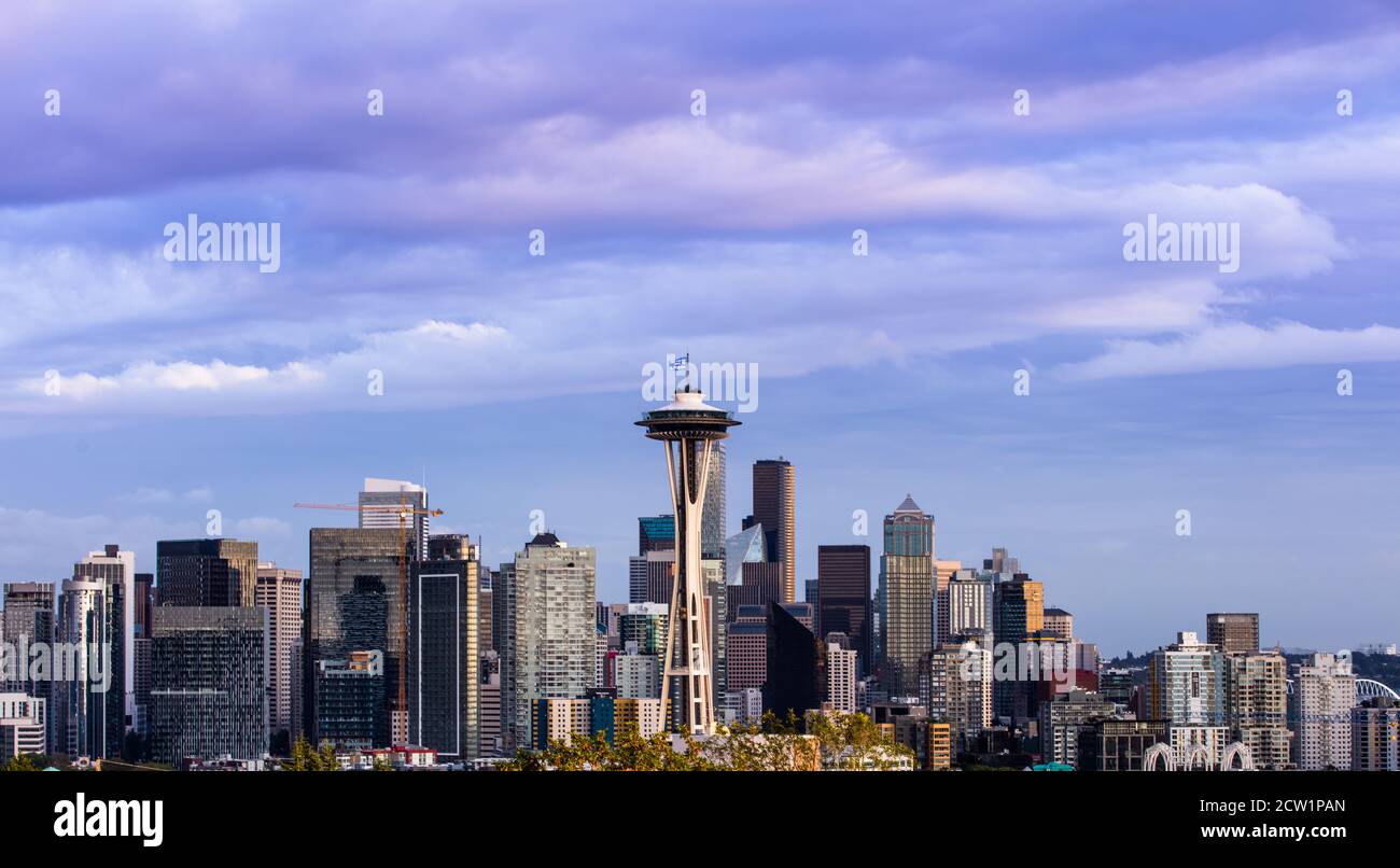 Cloudy Seattle skyline with the iconic Space Needle at dusk Stock Photo ...