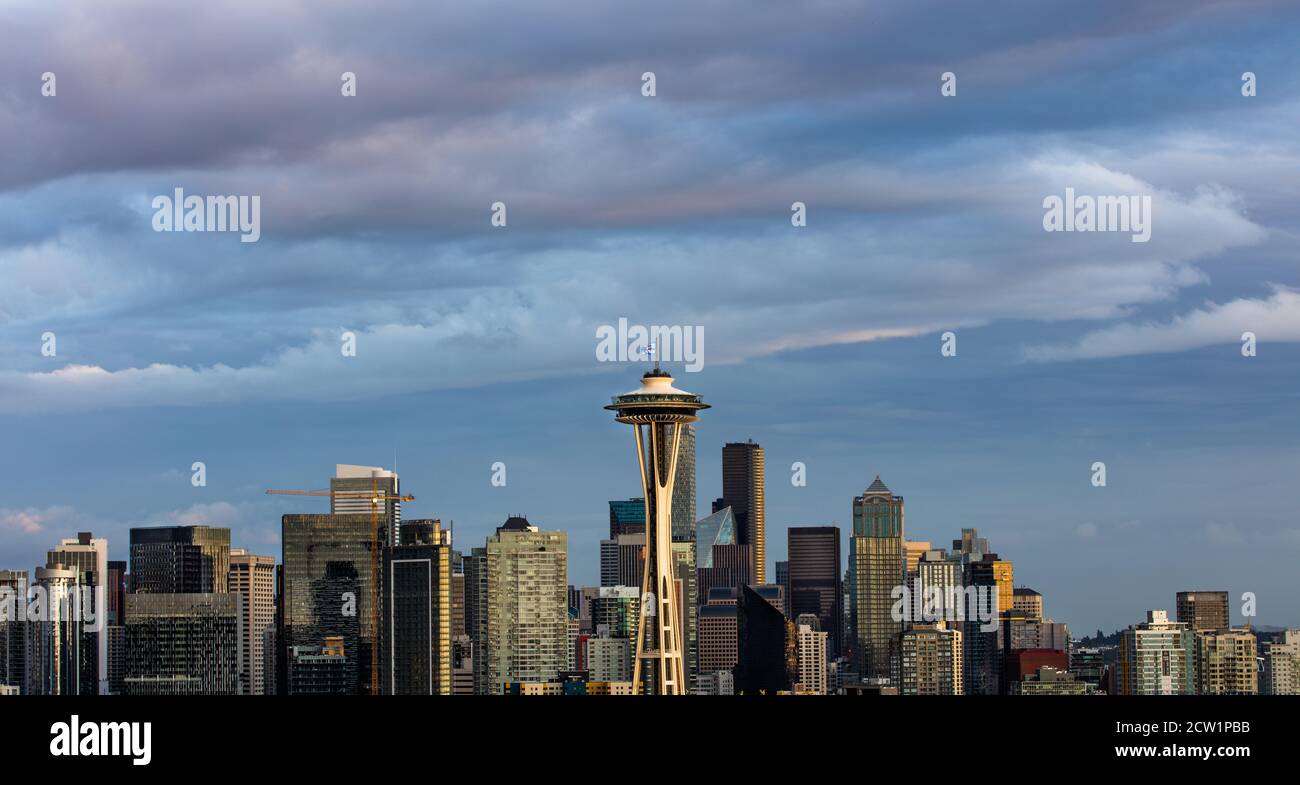 Cloudy Seattle skyline with the iconic Space Needle at dusk Stock Photo ...