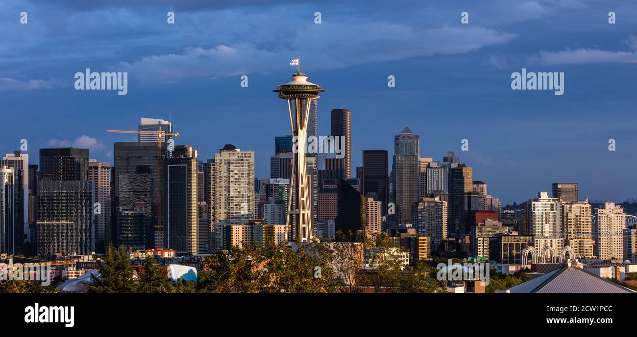 Cloudy Seattle skyline with the iconic Space Needle at dusk Stock Photo ...