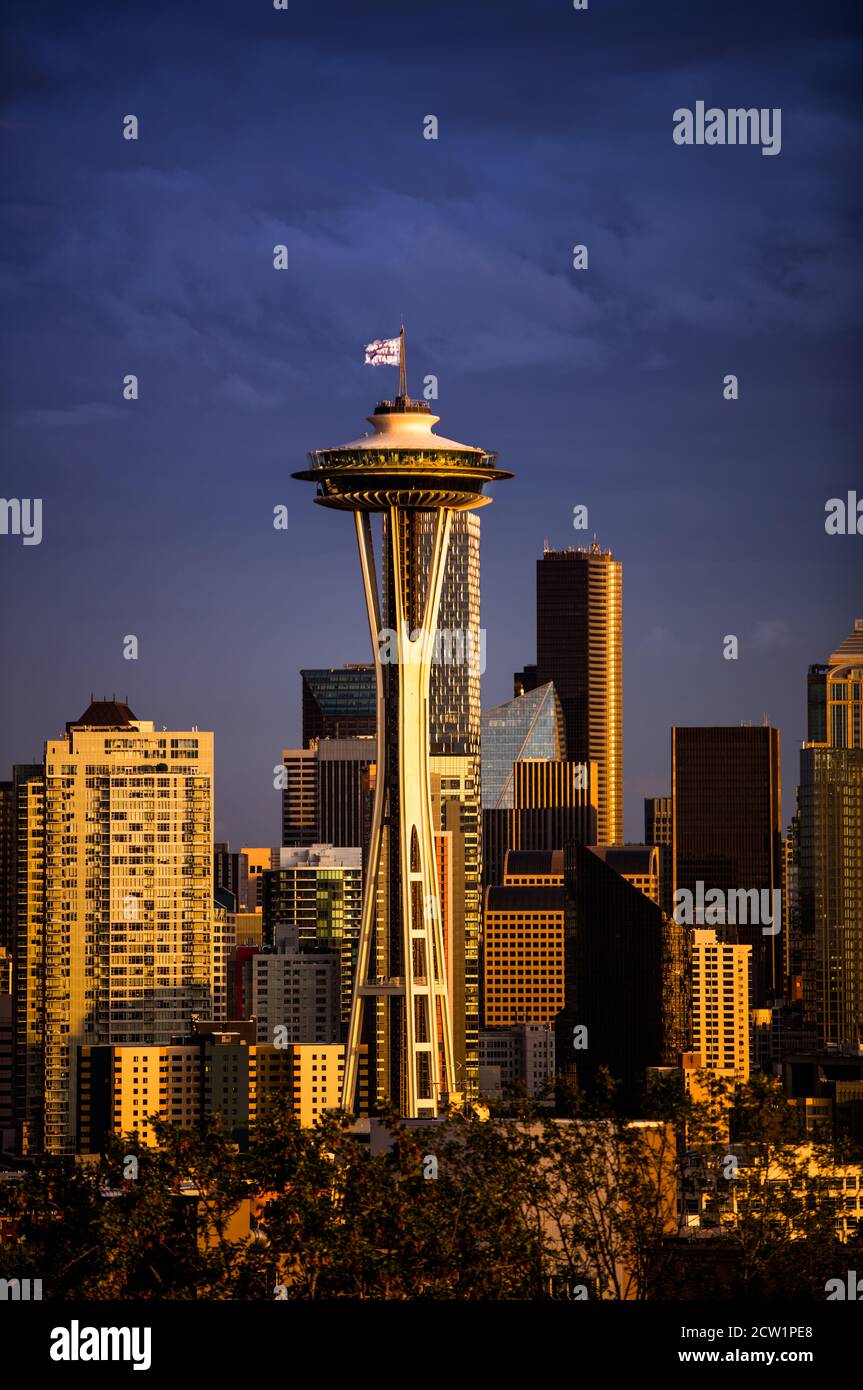 Cloudy Seattle skyline with the iconic Space Needle at dusk Stock Photo ...