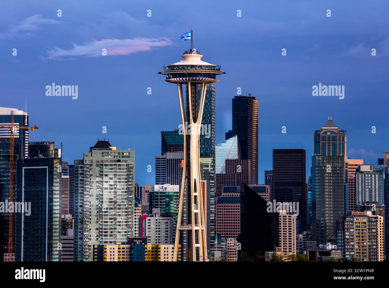 Cloudy Seattle skyline with the iconic Space Needle at dusk Stock Photo ...