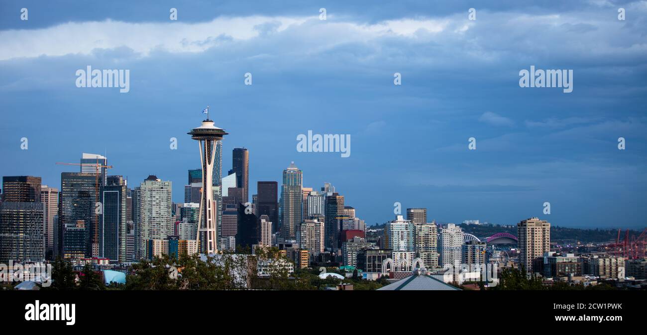 Cloudy Seattle skyline with the iconic Space Needle at dusk Stock Photo ...