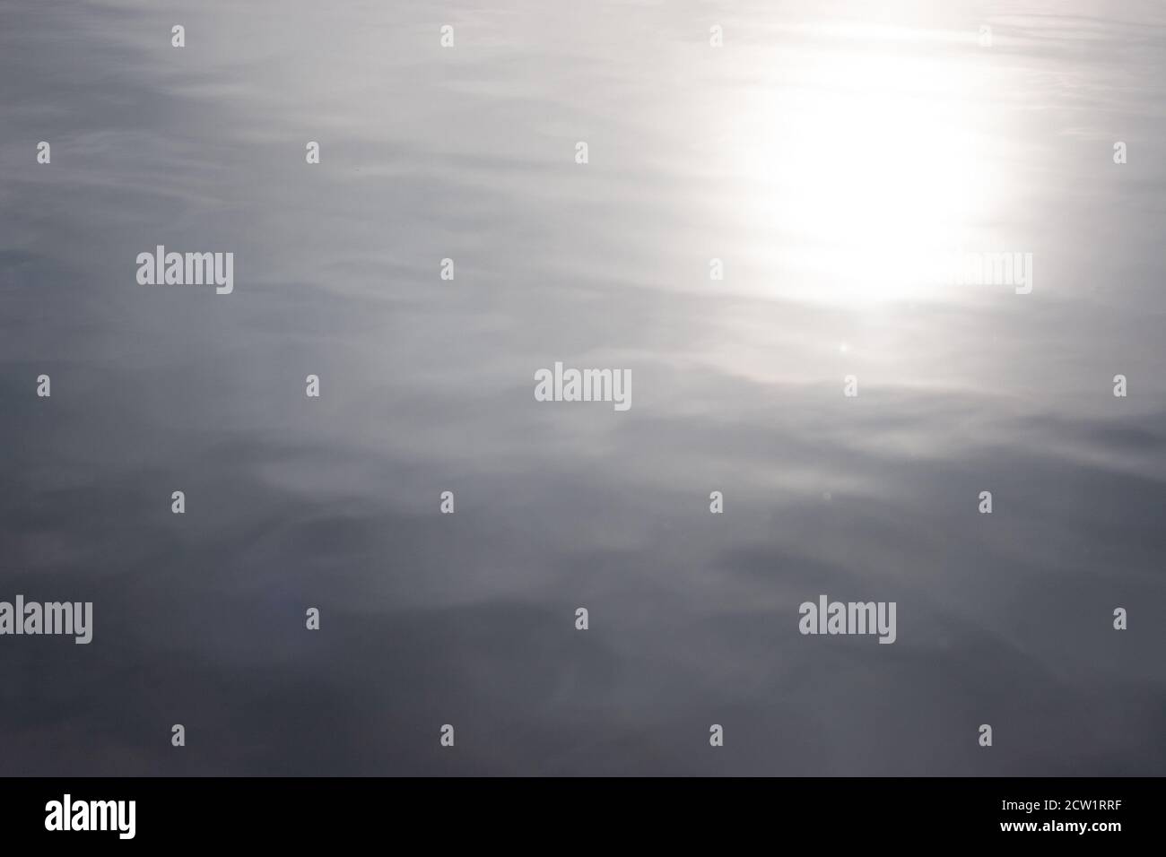 water surface reflecting the sun Stock Photo - Alamy