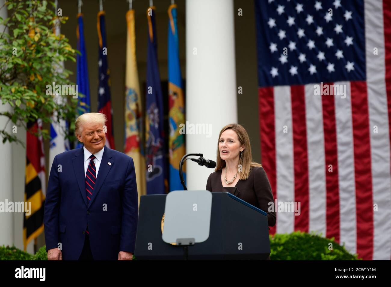 Washington, United States Of America. 26th Sep, 2020. President Donald Trump announces Amy Coney Barrett, 48, as his nominee for Associate Justice of the Supreme Court of the United States during a ceremony in the Rose Garden at The White House in Washington, DC., Saturday, September 26, 2020.Credit: Rod Lamkey/Consolidated News Photos | usage worldwide Credit: dpa/Alamy Live News Stock Photo