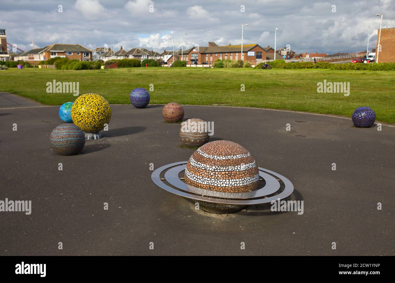 Sculptures of the planets in the solar system in a park. Astronomy, education, science for kids, 3d representation, fun learning, mosaics, Saturn Stock Photo