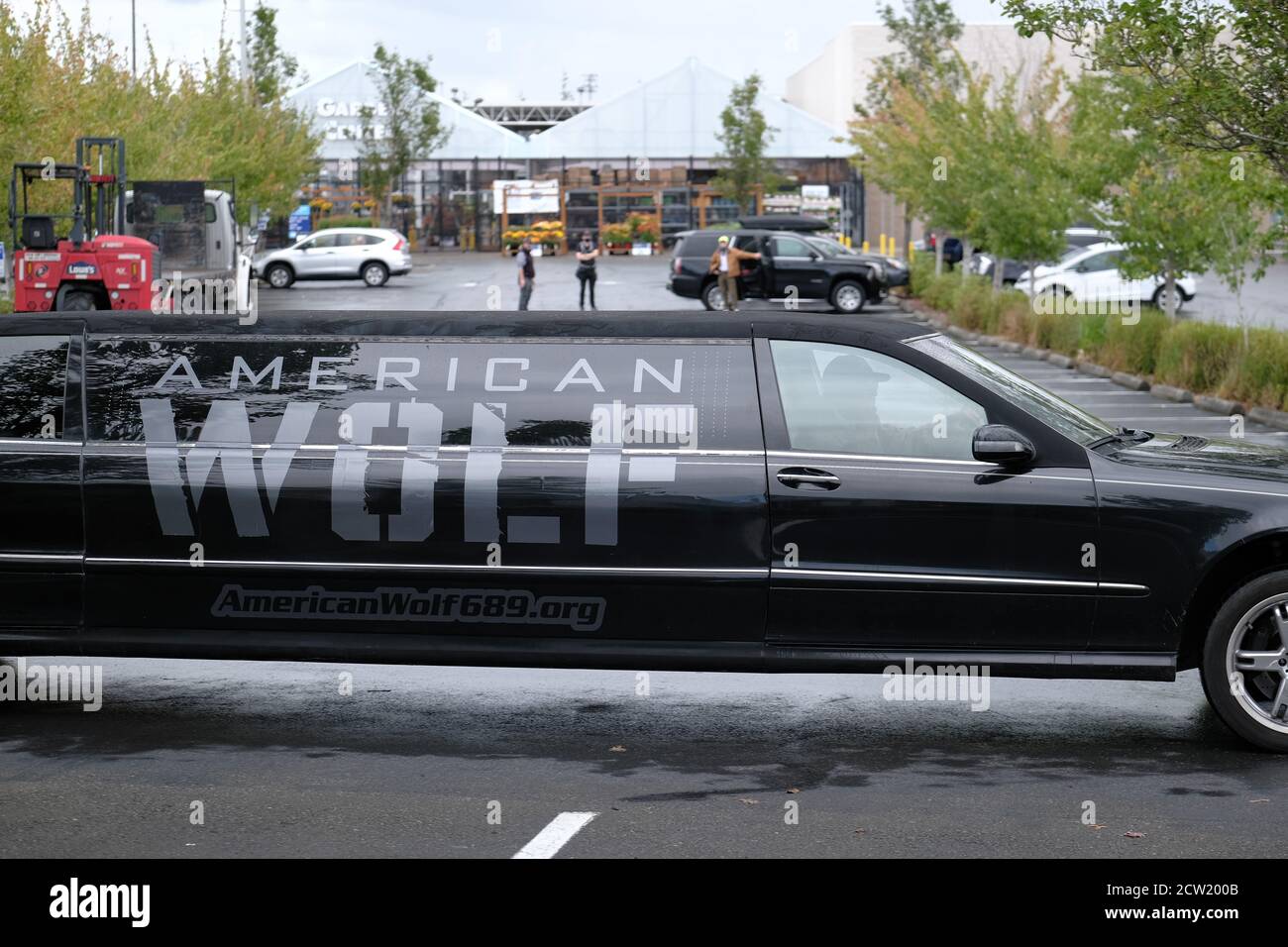 Portland, USA. 26th Sep, 2020. An American Wolf limousine drives around the area as Proud Boys gather in Portland, Ore., at Delta Park on September 26, 2020, in support of Kenosha shooter Kyle Rittenhouse and Aaron 'Jay' Danielson who was shot dead by an antifascist protester during the ongoing Black Lives Matter protests in the city. (Photo by Alex Milan Tracy/Sipa USA) Credit: Sipa USA/Alamy Live News Stock Photo