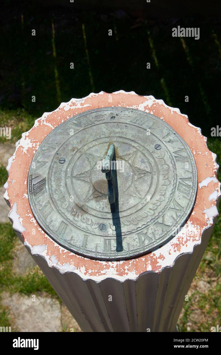 Sundial keeping time in garden. Stock Photo