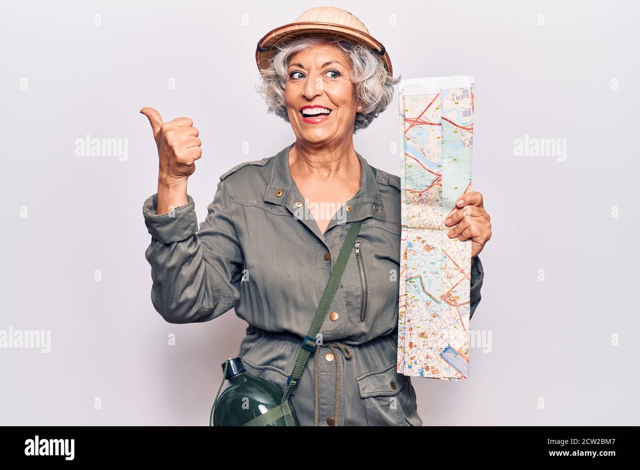 Old explorer holding map hi-res stock photography and images - Alamy