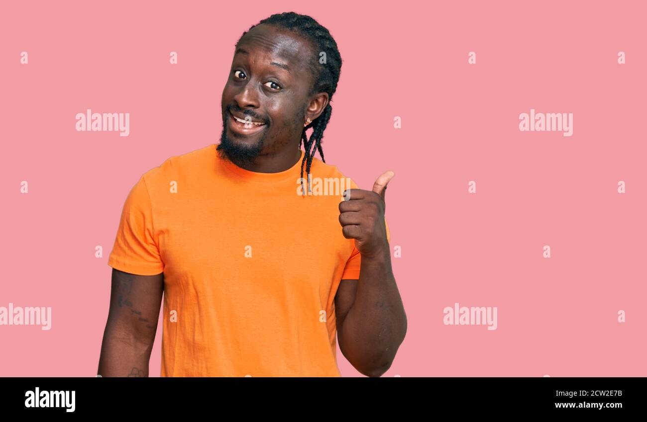 Handsome young african american man wearing casual clothes smiling with ...