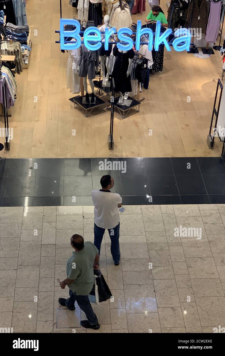 Shoppers are seen in front of Spanish clothing store Bershka, amid the  coronavirus disease (COVID-19) pandemic, at the Mall of Egypt, known as  "Mall Masr", owned and operated by the Majid Al