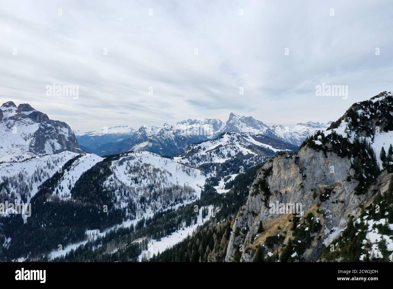 aerial snow covered mountain peaks in alps at winter Stock Photo - Alamy