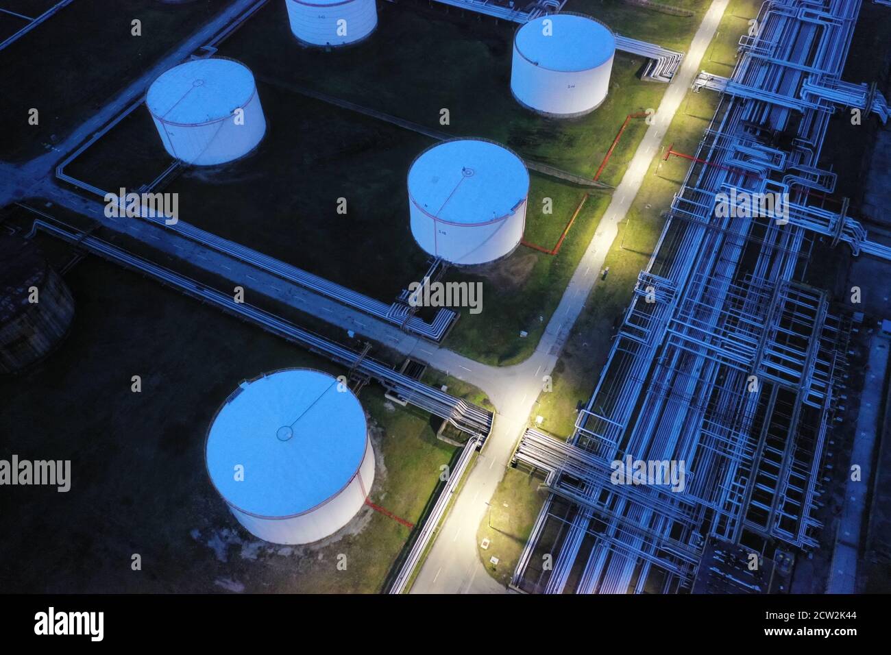 Aerial top view oil refinery at night hi-res stock photography and ...