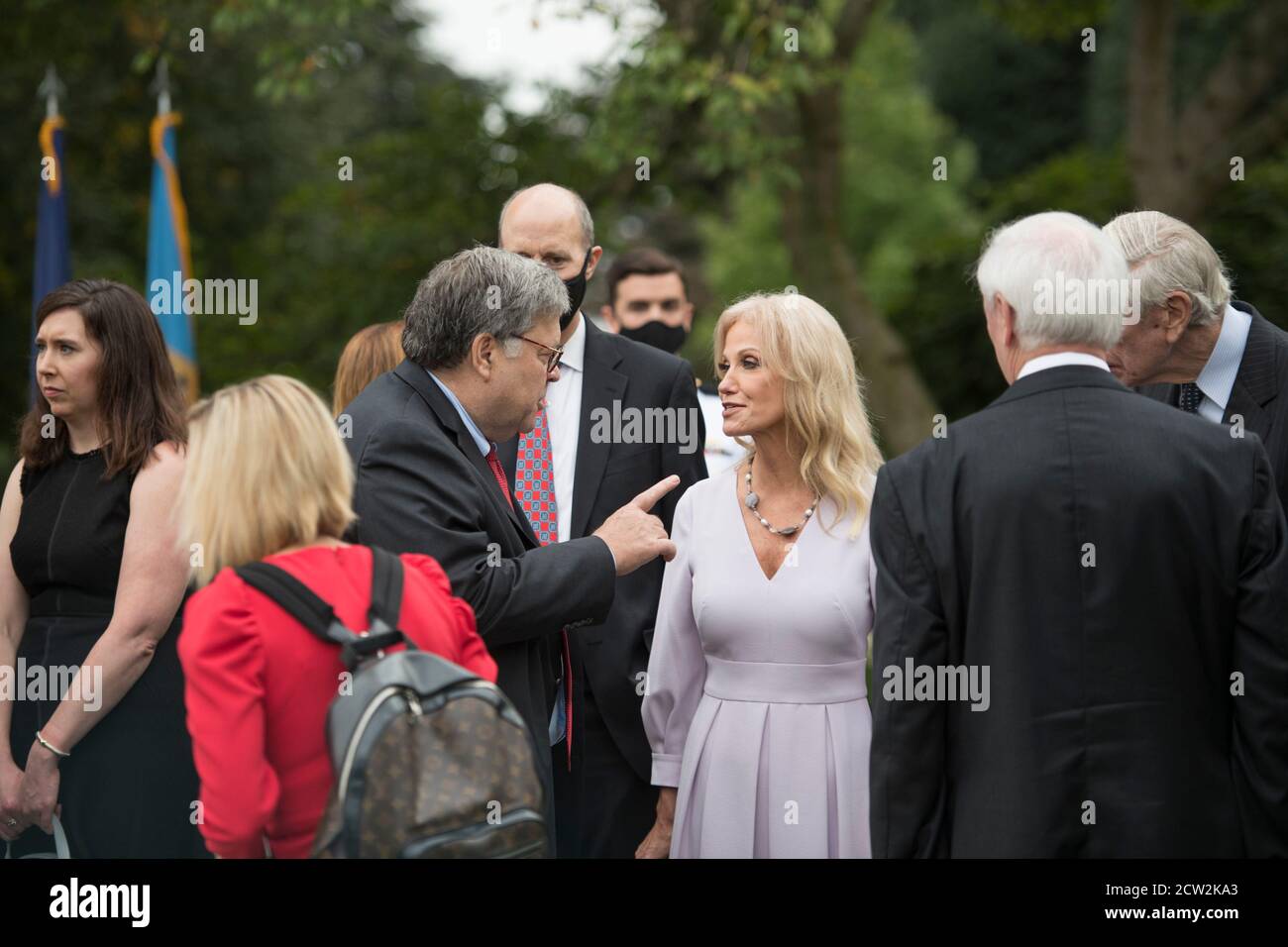 Washington, United States Of America. 26th Sep, 2020. Kellyanne Conway, right, chats with US Attorney General William Barr, left, following President Donald Trump's announcement of Amy Coney Barrett, 48, as his nominee for Associate Justice of the Supreme Court of the United States during a ceremony in the Rose Garden at The White House in Washington, DC., Saturday, September 26, 2020.Credit: Rod Lamkey/Consolidated News Photos | usage worldwide Credit: dpa/Alamy Live News Stock Photo