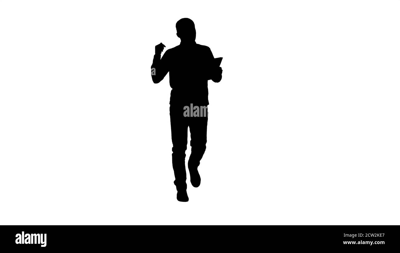 Silhouette Man in casual walking with tablet and talking via vid Stock ...