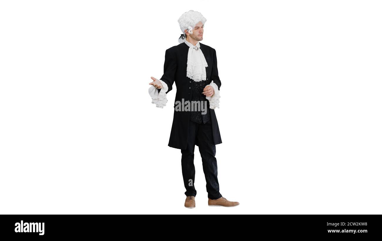 Man in 18th century camisole and wig doing welcoming gesture on Stock Photo