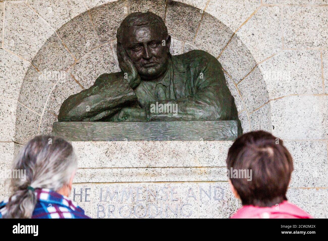 Cape Town, South Africa. 26th Sep, 2020. People are seen looking at a recently replaced head bust of Cecil John Rhodes, a controversial figure in the history of South Africa. The statue of 19th-century colonialist Cecil John Rhodes at Rhodes Memorial had been beheaded. Credit: SOPA Images Limited/Alamy Live News Stock Photo