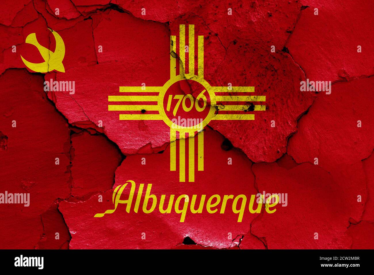 flag of Albuquerque painted on cracked wall Stock Photo