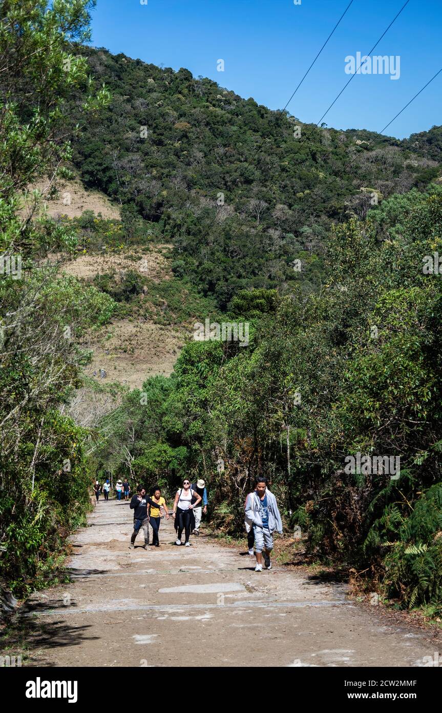 Group of people walking uphill hi-res stock photography and images - Alamy