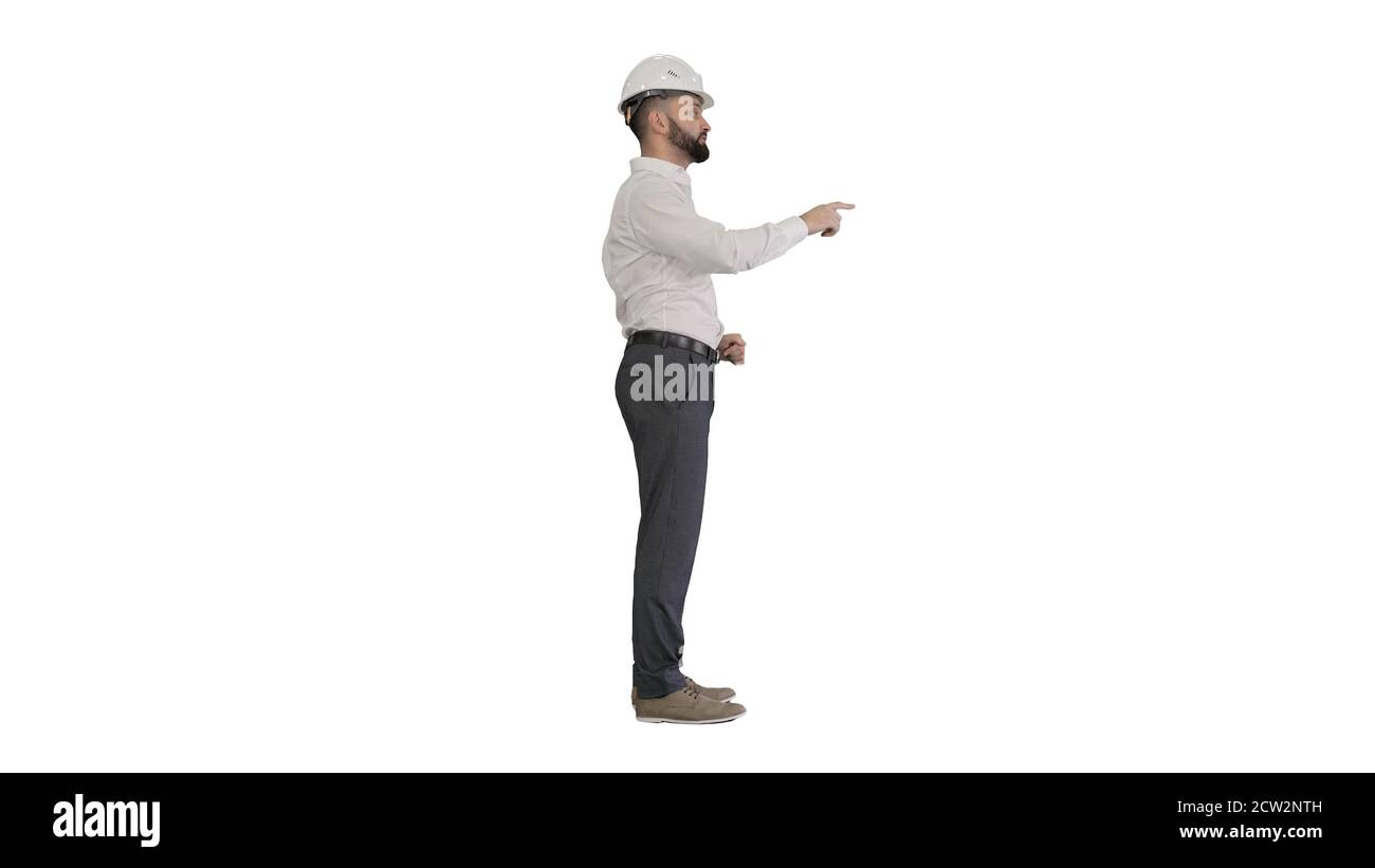 Engineer in a white helmet explaining something on white backgro Stock Photo