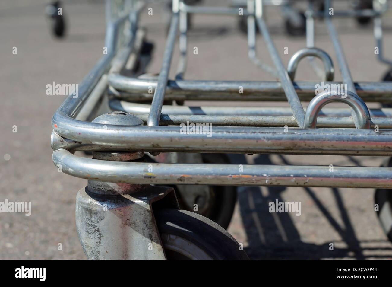 Supermarket Shopping HandCart Cart. Supermarket shopping trolleys in outdoor parking. Empty
