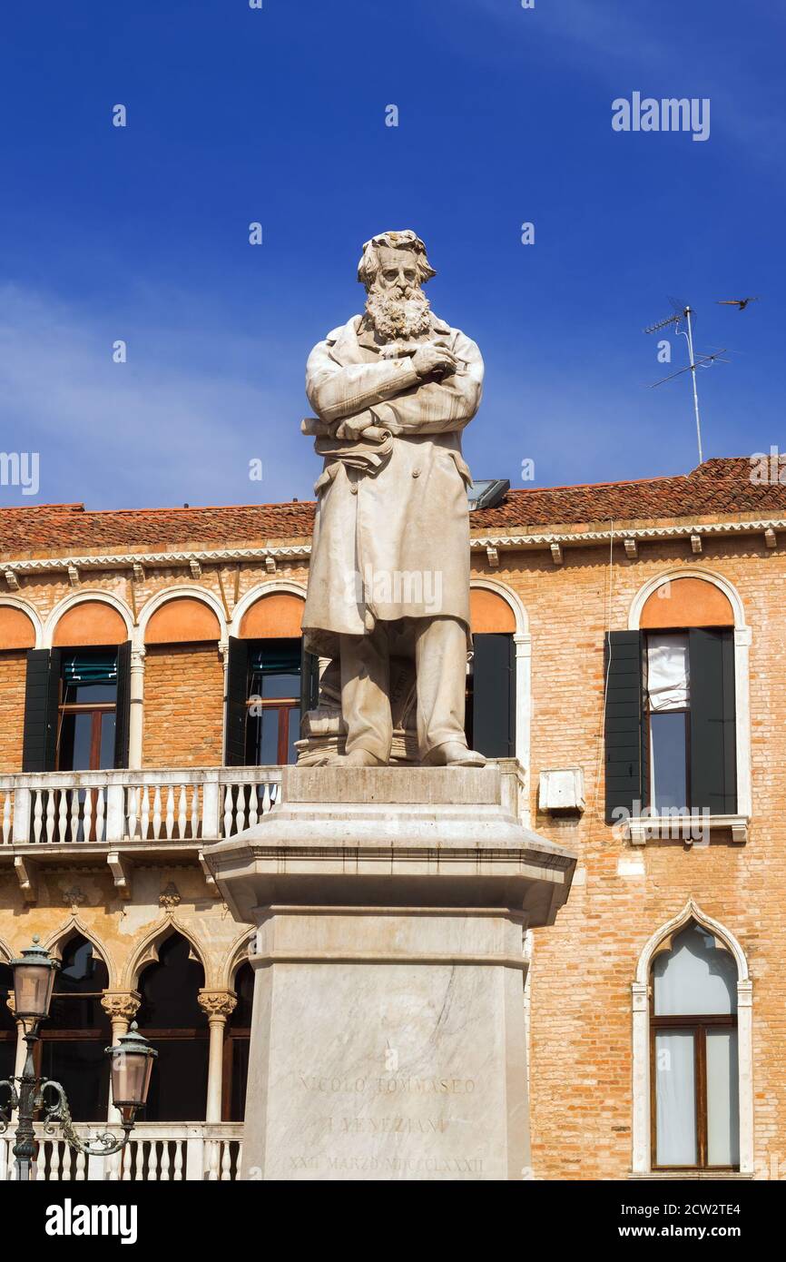 Statue of Niccolo Tommaseo in Campo Santo Stefano, Venice, Italy Stock Photo