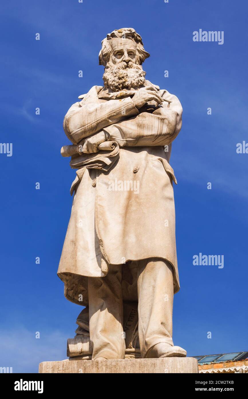 Statue of Niccolo Tommaseo in Campo Santo Stefano, Venice, Italy Stock Photo