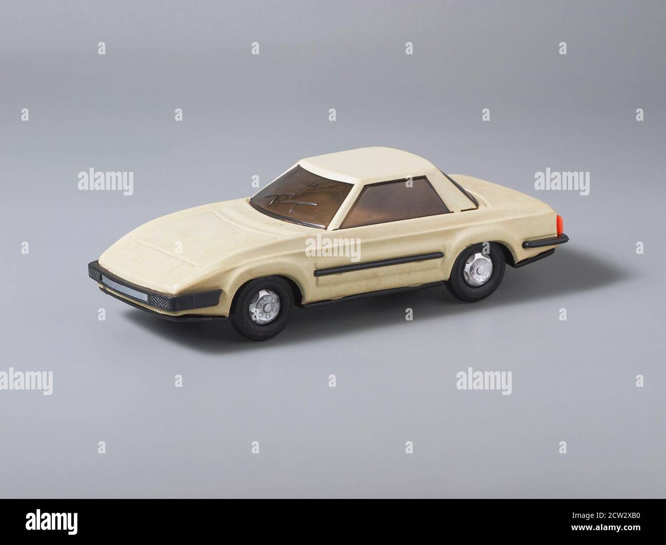 Broken white sedan tin toy cars. Made in China Stock Photo Alamy