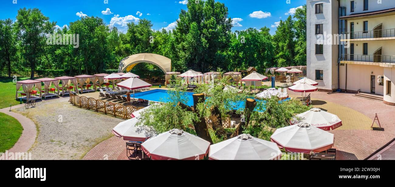 Zaporozhye, Ukraine 07.21.2020. Pool and recreation zone of Reikartz hotel in Zaporozhye, Ukraine, on a sunny summer morning Stock Photo