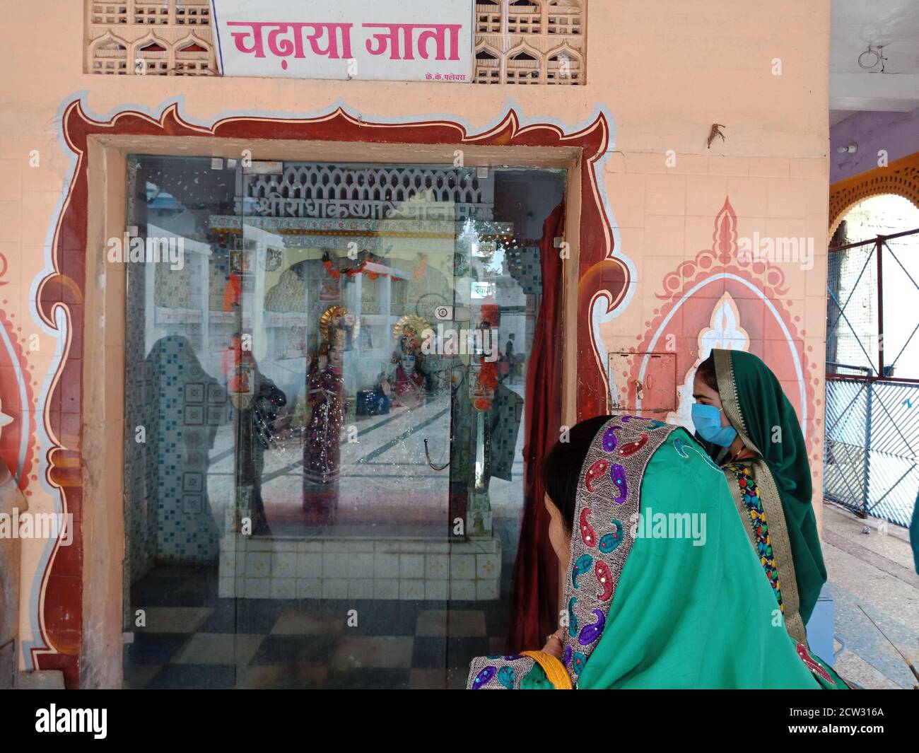 DISTRICT KATNI, INDIA - JULY 08, 2020: Indian traditional people worshiping at hindu religious place while travel. Stock Photo