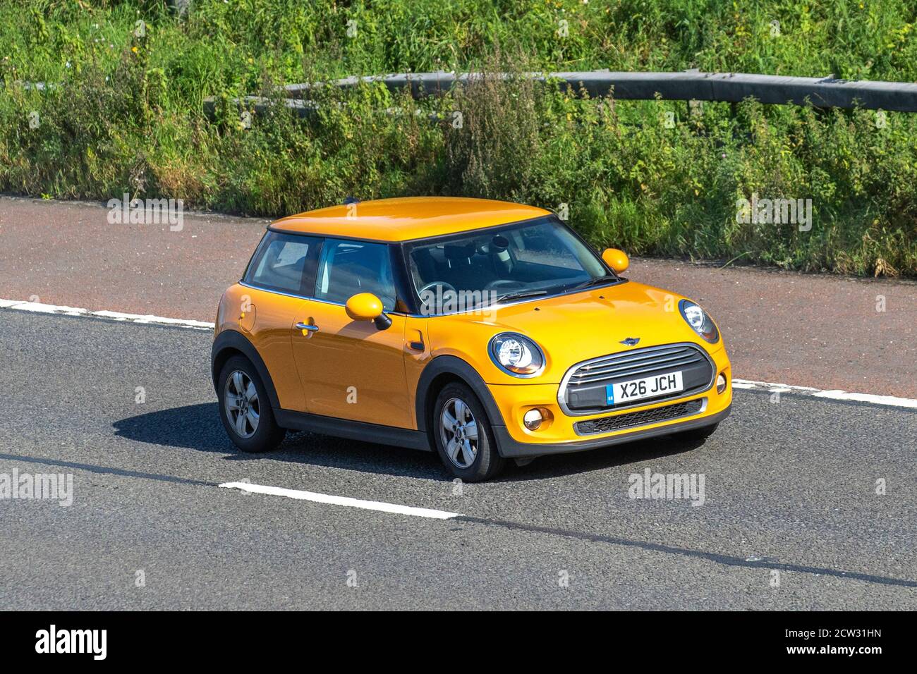 Mini hatch yellow cars hi-res stock photography and images - Alamy