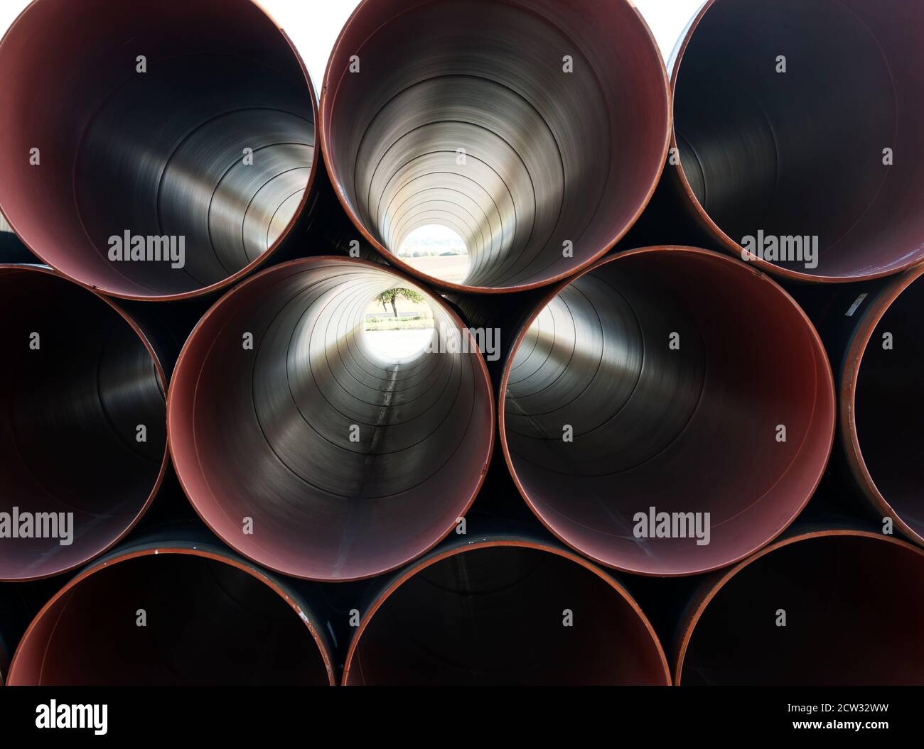 Stack of big plastic pipes used at the building site Stock Photo Alamy