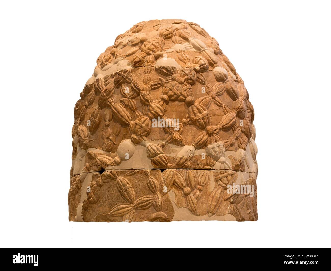 The Omphalos stone from Delphi, Greece, isolated. Stock Photo