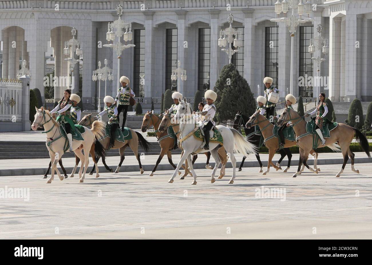 Participants ride horses during a parade marking Independence Day in Ashgabat, Turkmenistan September 27, 2020. REUTERS/Vyacheslav Sarkisyan Stock Photo
