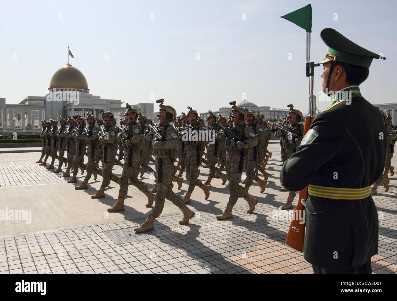 Turkmen service members take part in a parade marking Independence Day in Ashgabat, Turkmenistan September 27, 2020. REUTERS/Vyacheslav Sarkisyan Stock Photo