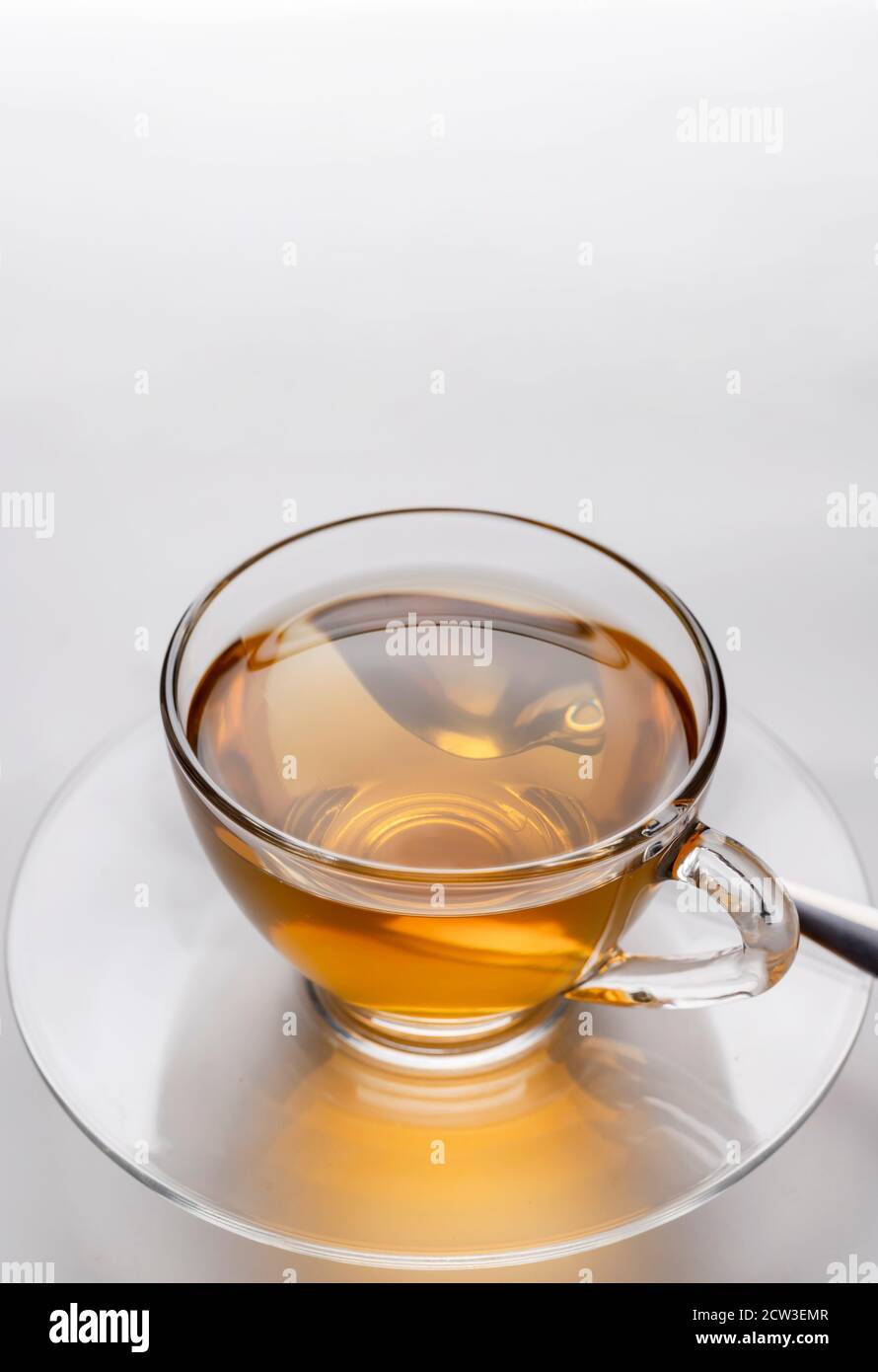 https://c8.alamy.com/comp/2CW3EMR/close-up-a-cup-of-freshly-brewed-hot-tea-in-a-glass-on-the-white-background-with-copy-space-2CW3EMR.jpg