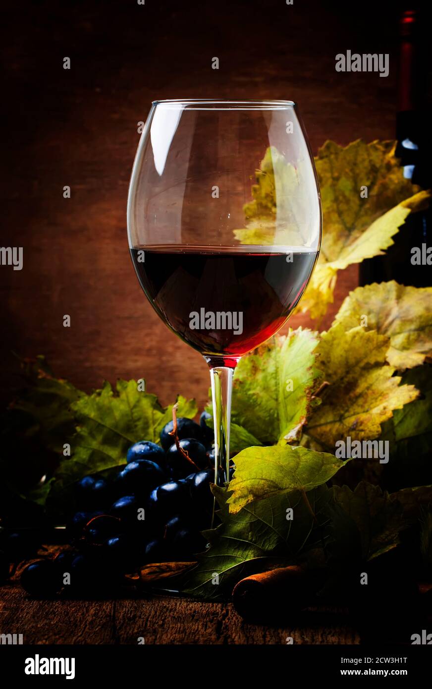 Red wine from grapes of sauvignon variety, still life in