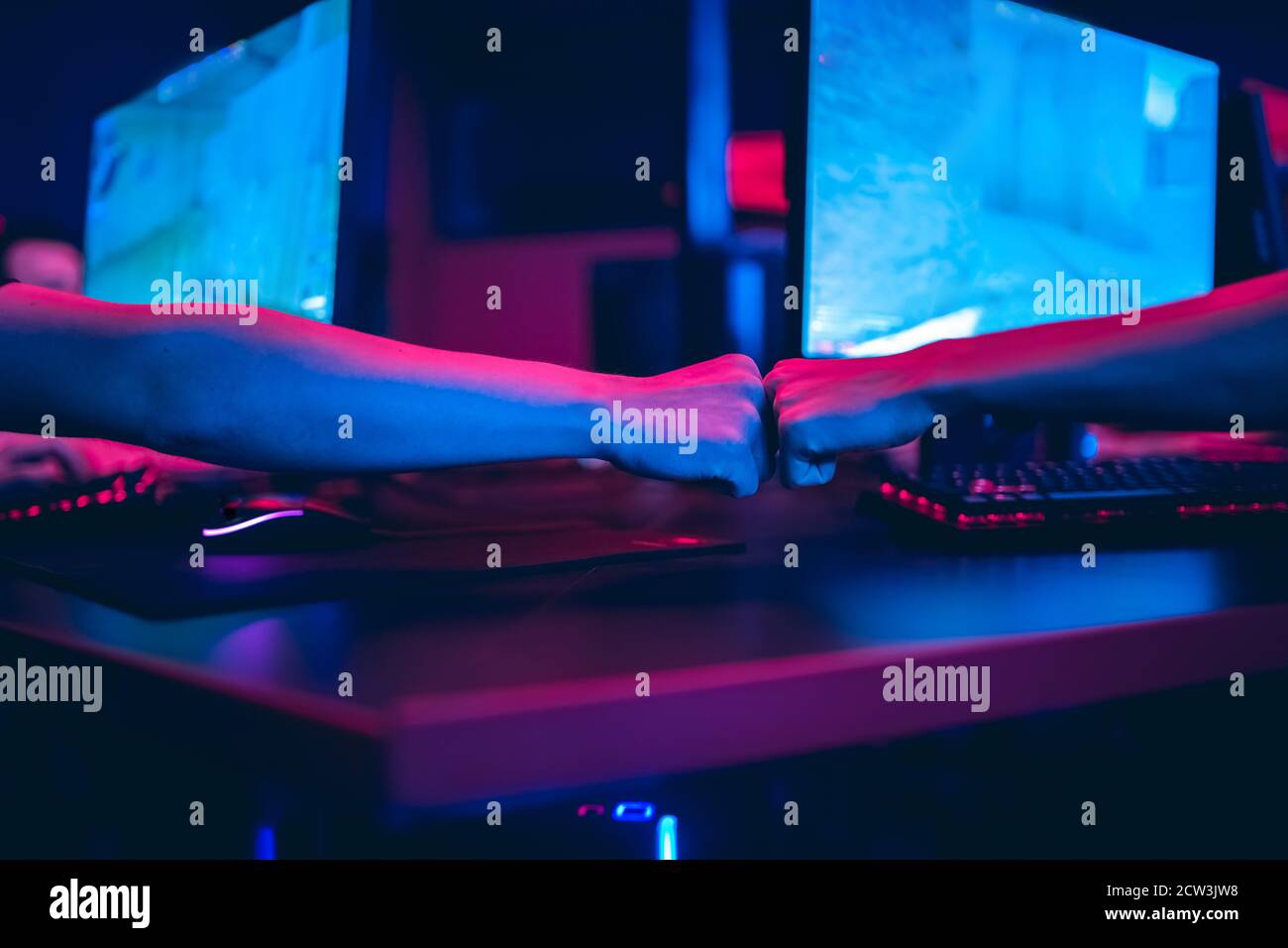 Professional gamer playing online games tournaments pc computer with