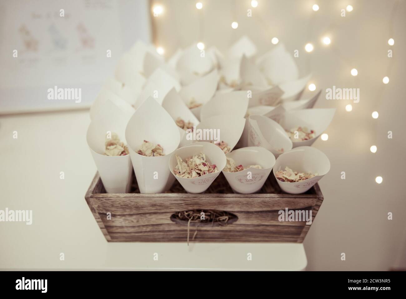 Natural Rose Petal Confetti in white paper cones Stock Photo Alamy