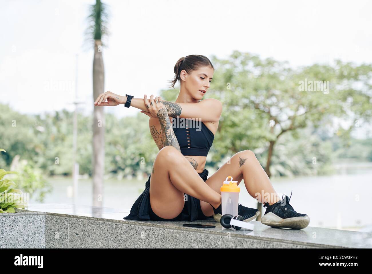 Woman stretching arms Stock Photo