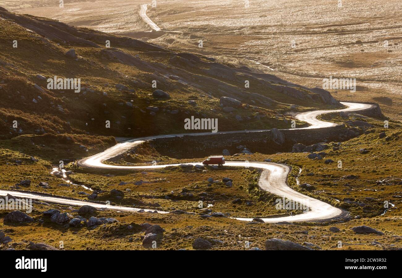 Healy Pass, Cork, Ireland. 27th September, 2020. A van slowly makes it's way on the R574, a serpentine like mountain road that meanders through the Caha Mountains from Castletownbere to the Healy Pass in West Cork, Ireland.  - Credit; David Creedon / Alamy Live News Stock Photo