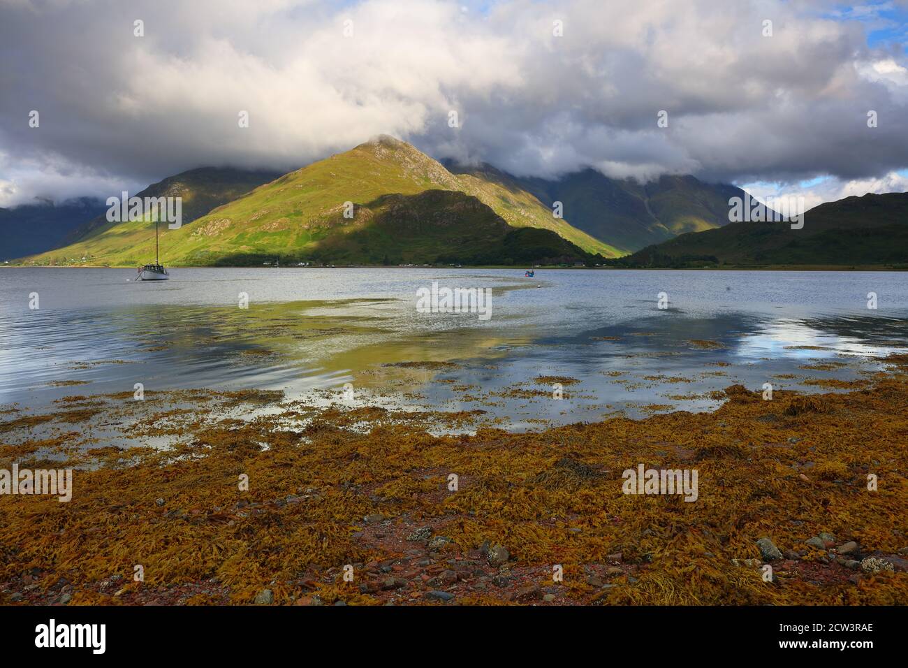 Landscape image of the Kintail Mountain range from the shores of Loch Duich, Glen Shiel, West Highlands, Scotland, UK. Stock Photo