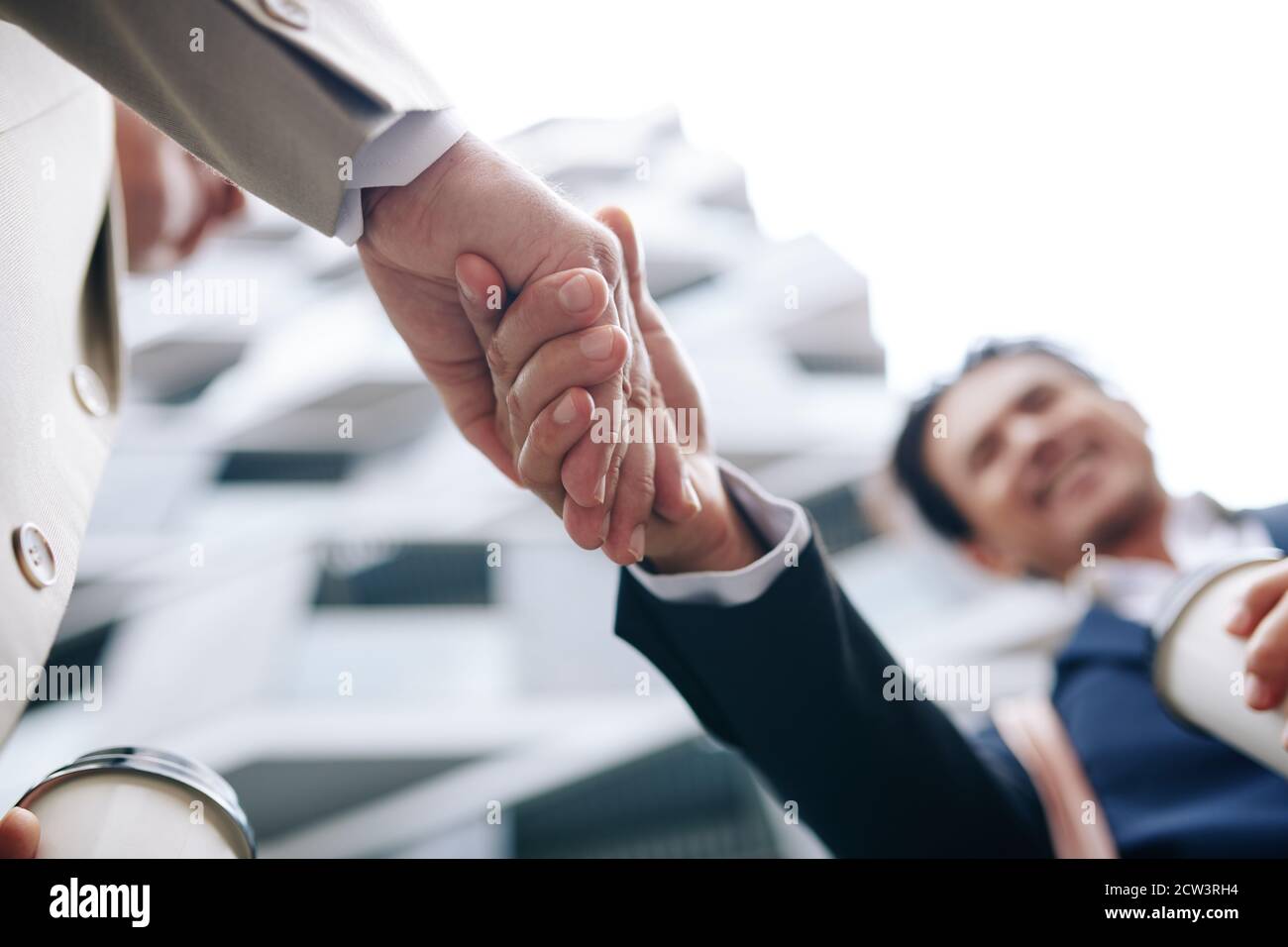 Business partners shaking hands Stock Photo