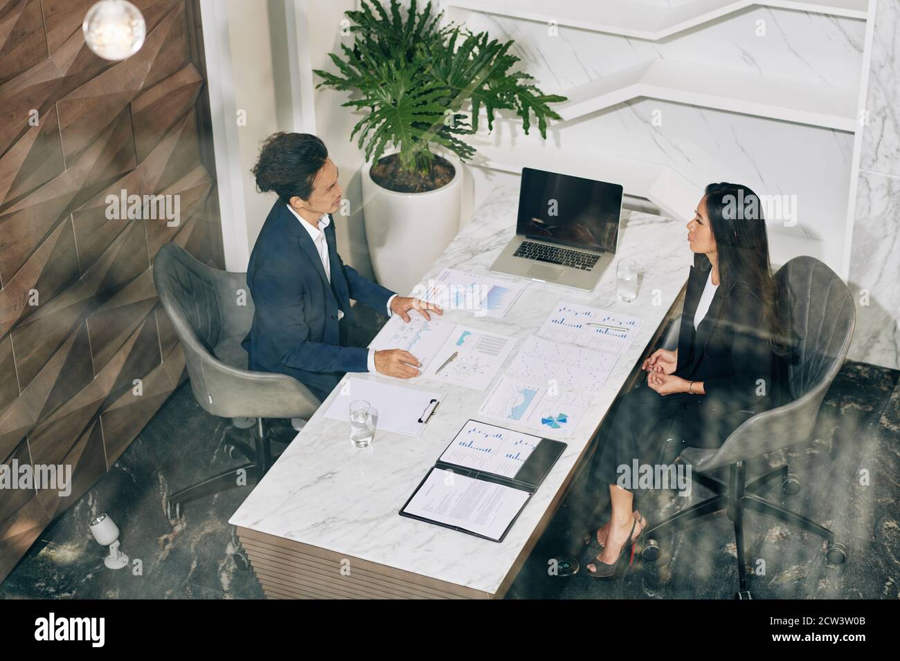 Discussing company development Stock Photo