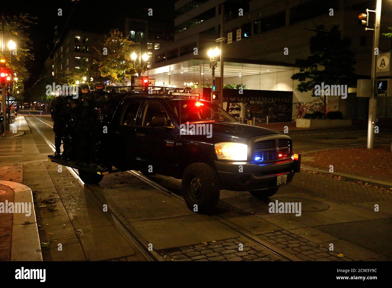 Police descend on protesters in fornt of the Police Bureau North Precinct on a night following several demonstrations around the city on September 26, 2020 in Portland Oregon. People demonstrate against. police violence and racial inequality in the downtown aea of the city. (Photo By John Lamparski/SIPA USA) Credit: Sipa USA/Alamy Live News Stock Photo