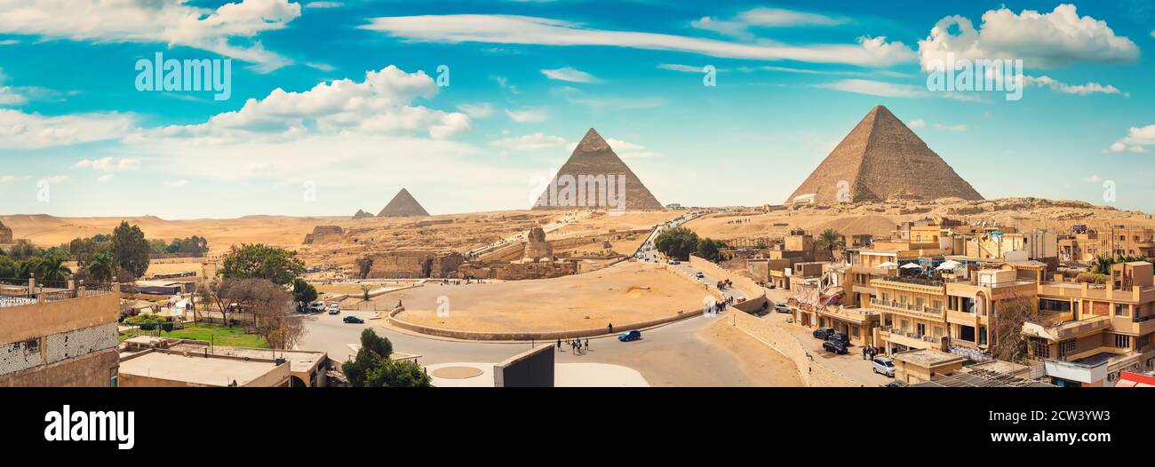 Sphinx and pyramids in the egyptian desert Stock Photo - Alamy