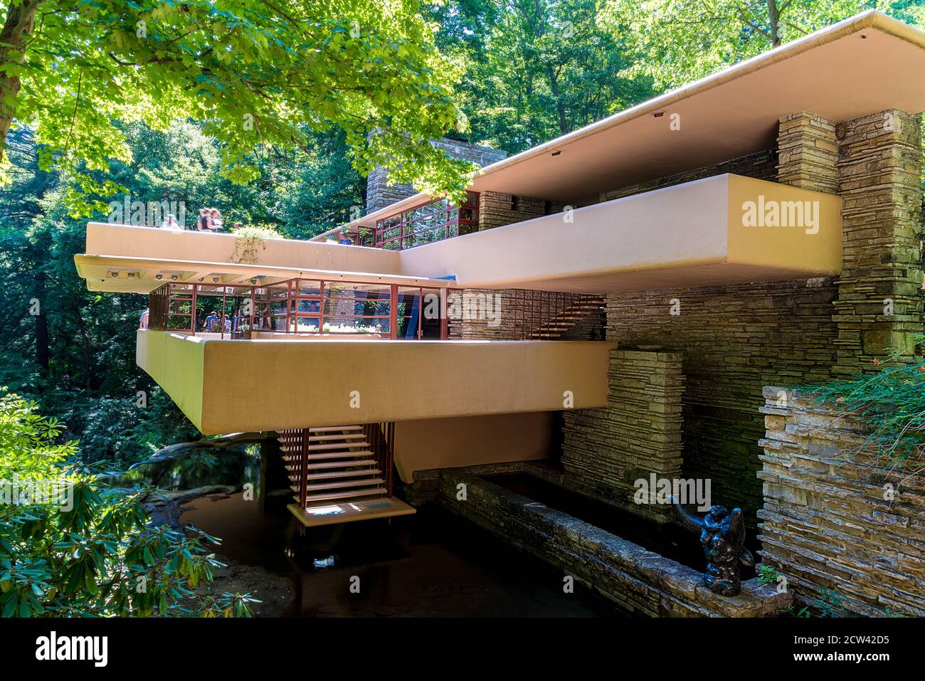 Falling water is a house designed by architect Frank Lloyd Wright in 1935 in rural southwestern Pennsylvania, 61 miles southeast of Pittsburgh. Stock Photo