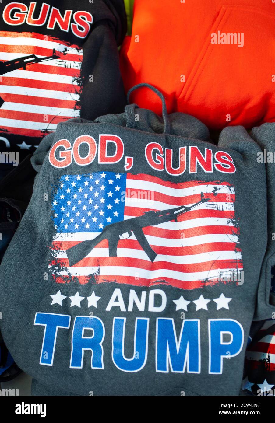 God, Guns and Trump sweatshirts for sale during an anti-coronavirus restrictions demonstration in Swampscott, Massachusetts, USA.  09/26/2020. Stock Photo