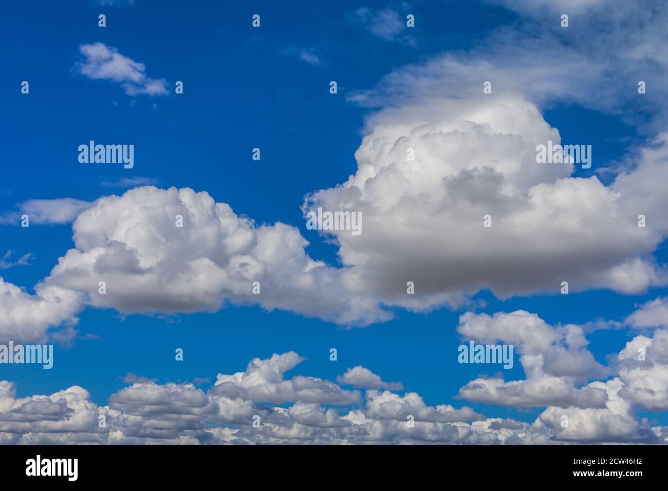 Summer Cumulus clouds and blue sky. Stock Photo