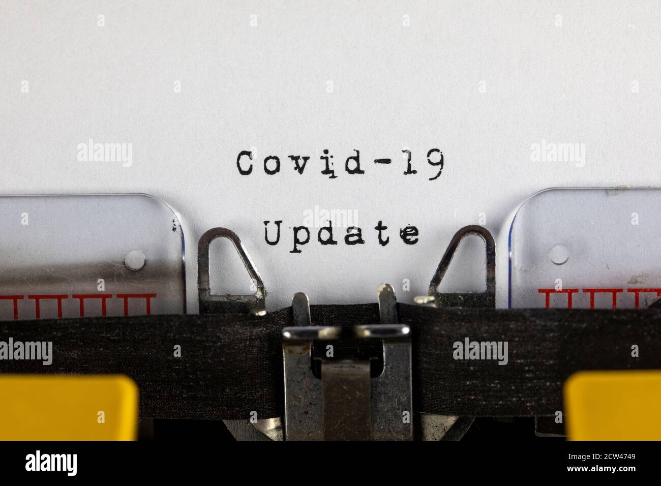 written on old typewriter with text Covid-19 Update. Covid-19, Coronavirus concept Stock Photo