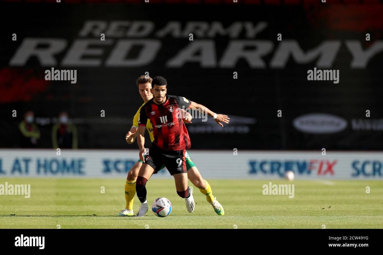 AFC Bournemouth's Dominic Solanke (front) and Norwich City's Christoph Zimmermann battle for the ball during the Sky Bet Championship match at The Vitality Stadium, Bournemouth. Stock Photo